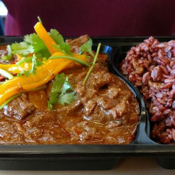 Pink Bee - Beef panang with red cargo rice - Sandwiches Near Me - Seattle, Washington Pink Bee - Beef panang with red cargo rice - Sandwiches Near Me - Seattle, Washington
