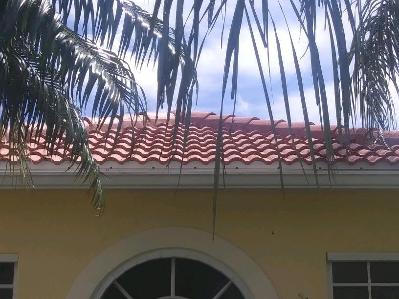 Slide of MilBar Roofing