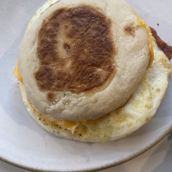 Fork Hill Kitchen - English Muffin with 2 eggs and bacon.  Comes with chips, but they were too good to keep for photo. - New American Near Me - Union City, New Jersey