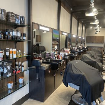 Hammer & Nails - Nolensville - Another shot of the barber area. Each chair has its own TV so you never miss a game! - Barbers Near Me - Nolensville, Tennessee