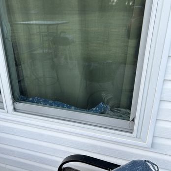 Renewal by Andersen of Alabama - towels put in track to try to block outside air coming in - Windows Installation Near Me - Birmingham, Alabama