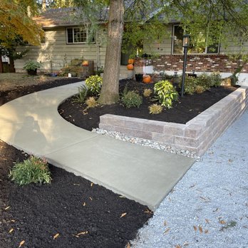 Universal Landscape - Concrete walkway, small retaining wall with plant bed - Landscaping Near Me - Tulalip, Washington Universal Landscape - Concrete walkway, small retaining wall with plant bed - Landscaping Near Me - Tulalip, Washington
