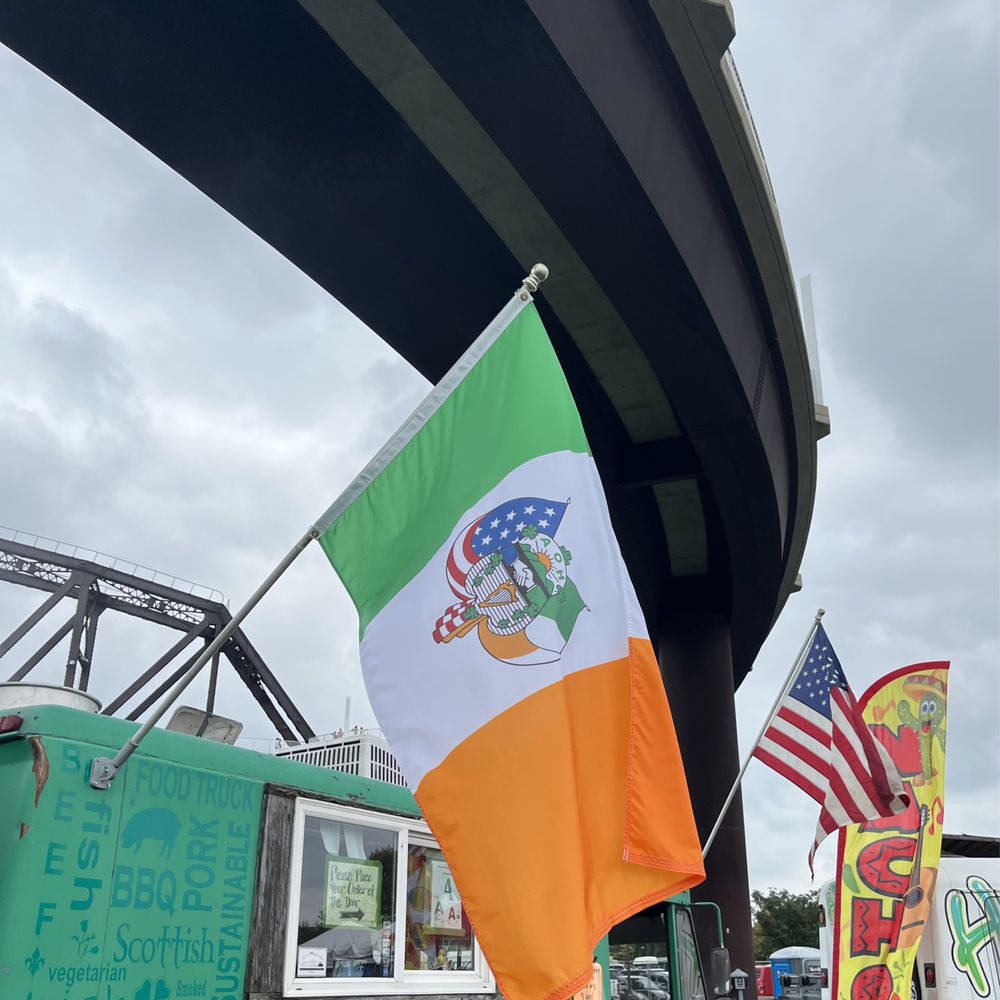 The Celtic Pig - a man holding an irish flag - Food Trucks Near Me The Celtic Pig - a man holding an irish flag - Food Trucks Near Me