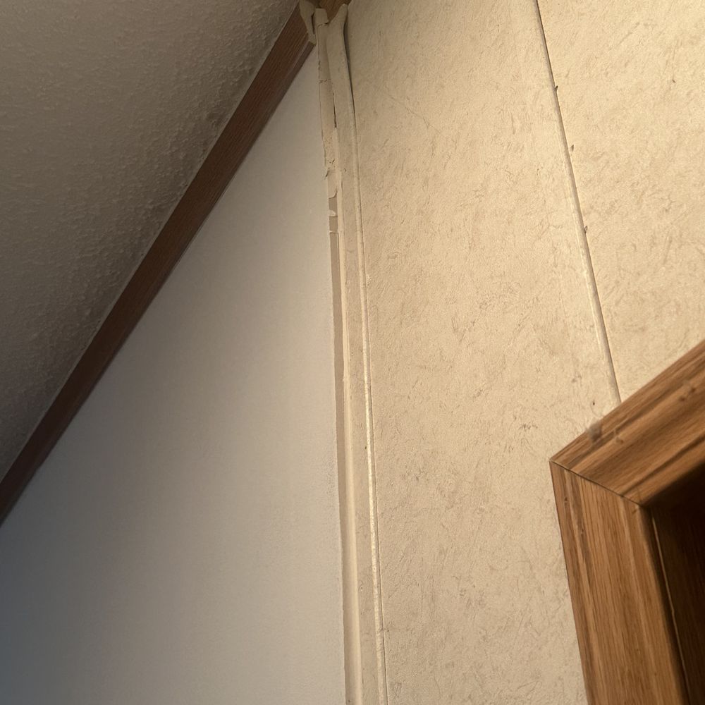 A&B Construction - The wall they built, they lines the studs up with the corner not allowing extra space for drywall. Common if you ask me. - General Contractors Near Me