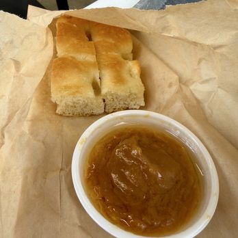 honeygrow - Olive oil focaccia bread with ginger sauce - Salad Near Me - Rochester Hills, Michigan honeygrow - Olive oil focaccia bread with ginger sauce - Salad Near Me - Rochester Hills, Michigan