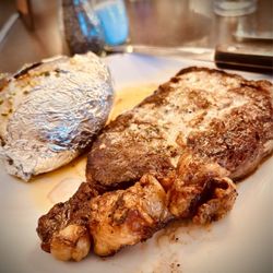 General Denver - Ribeye steak with a side of baked potato