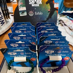 Tidepool Toys & Games - Discovery Shark Week x Fahlo bracelets at Tidepool Toys and Games let customers track real sharks while wearing colorful ocea...