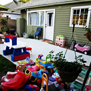 Cottage Care Academy - Backyard patio with lots of toys and space to play - Child Care & Day Care Near Me - Upland, California Cottage Care Academy - Backyard patio with lots of toys and space to play - Child Care & Day Care Near Me - Upland, California