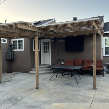 Eddie’s OC Projects  - Pergola before, with old rusty screws and mismatched paints - Painters Near Me