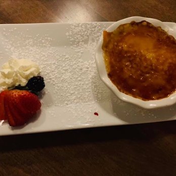 Queen's Café - a bowl of creme with whipped cream and strawberries - American Near Me - Guelph, Ontario
