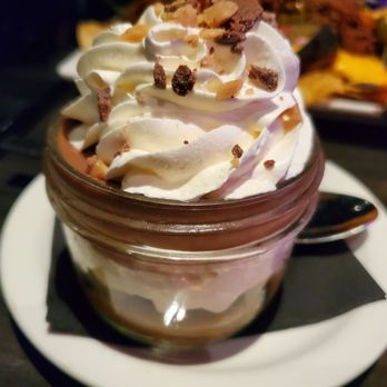 Irvine Improv - Chocolate brownie & toffee pudding cup - really good! *But add on to your order if you don't want it delivered with your appetizers. - Comedy Clubs Near Me - Irvine, California Irvine Improv - Chocolate brownie & toffee pudding cup - really good! *But add on to your order if you don't want it delivered with your appetizers. - Comedy Clubs Near Me - Irvine, California