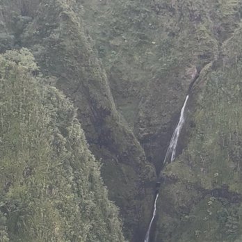 Rainbow Helicopters - Aerial view of the waterfall. - Aerial Tours Near Me - Honolulu, Hawaii Rainbow Helicopters - Aerial view of the waterfall. - Aerial Tours Near Me - Honolulu, Hawaii