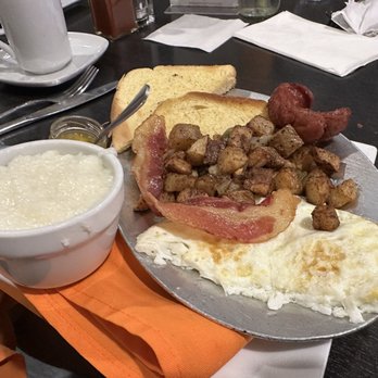 Mango Mangeaux - Skillet with eggs over easy. Grits were very good. - New American Near Me - Hampton, Virginia Mango Mangeaux - Skillet with eggs over easy. Grits were very good. - New American Near Me - Hampton, Virginia