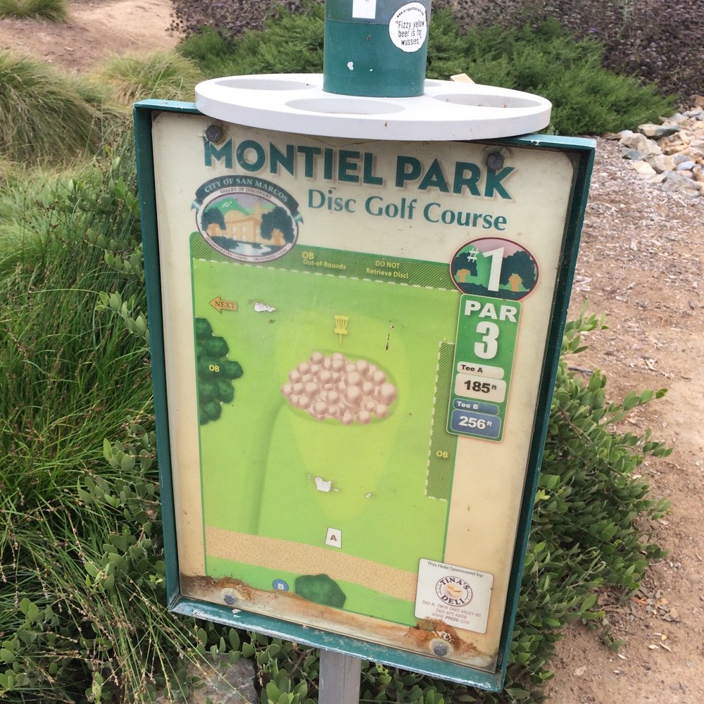 Montiel Park Disc Golf Course - The first tee. 185 for forward tee, 256 for back tee. - Disc Golf Near Me - San Marcos, California Montiel Park Disc Golf Course - The first tee. 185 for forward tee, 256 for back tee. - Disc Golf Near Me - San Marcos, California