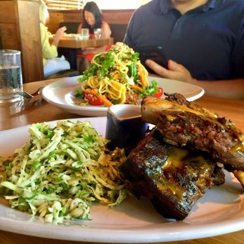 R+D Kitchen - Campfire Barbecue Beef Ribs (front) & Thai Steak & Noodle Salad (rear). - New American Near Me - Yountville, California