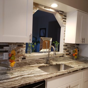 Alexander Contractor Service - a kitchen with granite countertops - General Contractors Near Me - Suffolk, Virginia Alexander Contractor Service - a kitchen with granite countertops - General Contractors Near Me - Suffolk, Virginia