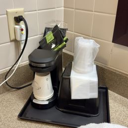 Coffee maker and ice box in the bathroom, disgusting Coffee maker and ice box in the bathroom, disgusting