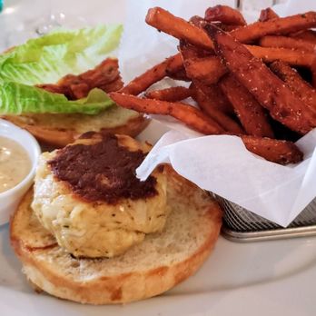 PassionFish Reston - Crabcake sandwich with sweet potato fries - Seafood Near Me - Reston, Virginia PassionFish Reston - Crabcake sandwich with sweet potato fries - Seafood Near Me - Reston, Virginia