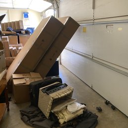 They literally threw the boxes in the garage. Pictures don't lie