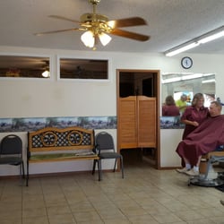Toby Barber shop - Toby in action! She also prefers a western theme as can be seen from this and other pics of her shop.