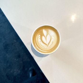 Found Coffee - Bellwoods - a cup of cappuccino on a table - Coffee & Tea Near Me - Toronto, Ontario