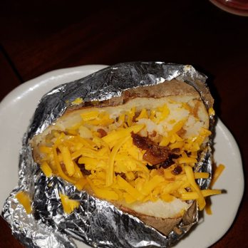 Pappadeaux Seafood Kitchen - A baked potato with cheddar cheese, and bacon only. - Cajun/Creole Near Me - Springdale, Ohio Pappadeaux Seafood Kitchen - A baked potato with cheddar cheese, and bacon only. - Cajun/Creole Near Me - Springdale, Ohio