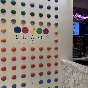Sugar Factory - Wall by waiting entrance - American Near Me - Detroit, Michigan Sugar Factory - Wall by waiting entrance - American Near Me - Detroit, Michigan