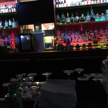 Two Rivers Tavern - a bar with many bottles of alcohol - Music Venues Near Me - San Antonio, Texas Two Rivers Tavern - a bar with many bottles of alcohol - Music Venues Near Me - San Antonio, Texas