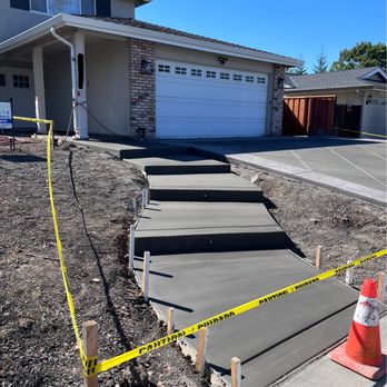 QC Concrete - Freshly poured walkway - Masonry/Concrete Near Me