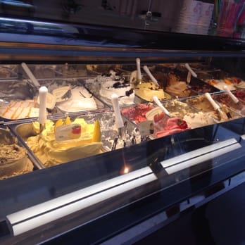Fellini Caffè - Gelato with fresh fruit sticking out on the fruit flavored gelato's. - Italian Near Me - Houston, Texas