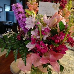 Ms Bumblebees's Flowers & Gifts - I told them my mom likes pinks and mauves and they whipped this up! Gorgeous.