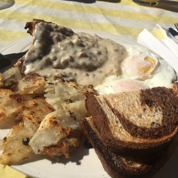 Lido Cafe - Grilled pork chop w/country gravy, 2 eggs over easy, home fried potatoes, and rye toast - Comfort Food Near Me - Carmichael, California Lido Cafe - Grilled pork chop w/country gravy, 2 eggs over easy, home fried potatoes, and rye toast - Comfort Food Near Me - Carmichael, California