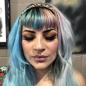 Blackbird Tattoo - Labret piercing  by Jose - Tattoo Near Me - Covina, California