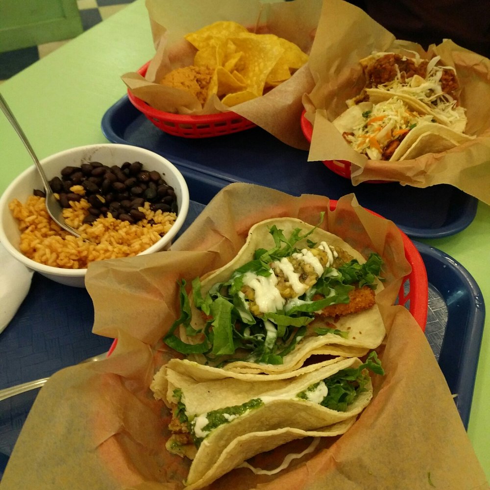 Taco Party - Two meals, one with chips and dip and the other with rice and beans. We tried the tofu, tempeh, chorizo, and jackfruit tacos. - Mexican Near Me - Somerville, Massachusetts Taco Party - Two meals, one with chips and dip and the other with rice and beans. We tried the tofu, tempeh, chorizo, and jackfruit tacos. - Mexican Near Me - Somerville, Massachusetts