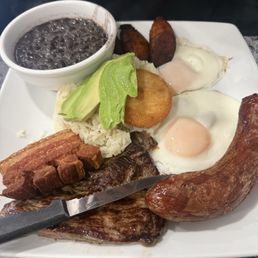 Chorizo, chiccaron, steak, rice and beans. Chorizo, chiccaron, steak, rice and beans.