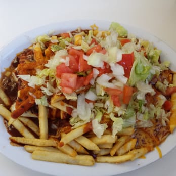 Alejandro's Cafe - Millie's burrito plate with red chile - Cafes Near Me - Belen, New Mexico