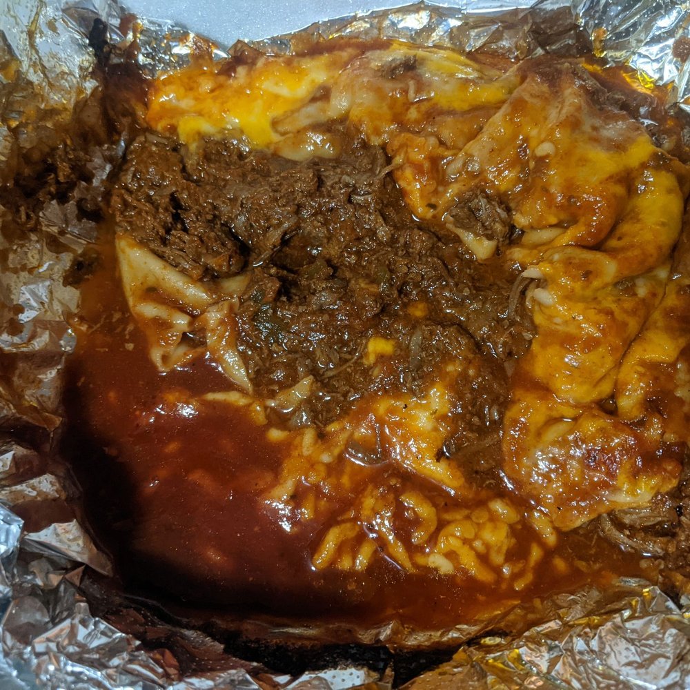 This nasty mess was made by elby's said it was a burrito don't waste your money or just go pick up some roadkill This nasty mess was made by elby's said it was a burrito don't waste your money or just go pick up some roadkill