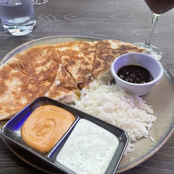 Little Tijuana - Chicken quesadilla, white rice, and black beans..with red sangria and two different spicy sauce - Lounges Near Me - Newark, New Jersey Little Tijuana - Chicken quesadilla, white rice, and black beans..with red sangria and two different spicy sauce - Lounges Near Me - Newark, New Jersey