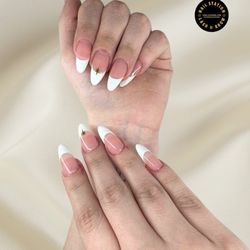 Nail Station and Lash & Brow Studio - Timeless French, Always Elegant Clean, classy, and effortlessly beautiful. This modern white French tip set is perfect for weddings, va