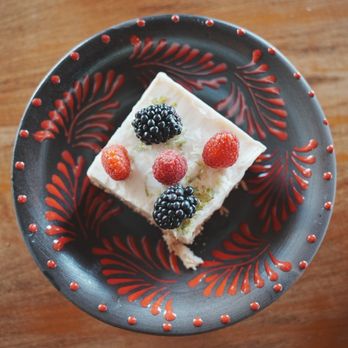 Felina - Carlota de Limón. Layers of crumbled Maria cookies with a creamy, tangy lime filling. This dessert is chilled for a cool, refreshing bite. - Pizza Near Me - Fort Worth, Texas