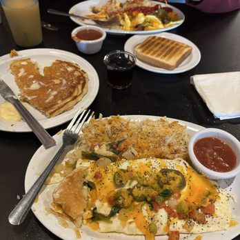 Blue Mound Cafe - Little Road - My veggie omelette with jalapeño peppers, hash browns, the pancake we split and hubbub Mr. Porky omelette. - Cafes Near Me - Arlington, Texas Blue Mound Cafe - Little Road - My veggie omelette with jalapeño peppers, hash browns, the pancake we split and hubbub Mr. Porky omelette. - Cafes Near Me - Arlington, Texas