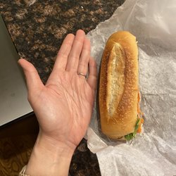 A Chau Restaurant - $7 for a mini banh mi!!! I have normal hand, and this sandwich is so small...