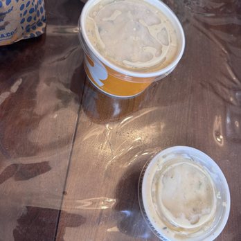 QDOBA Mexican Eats - A small, and a large queso dip  for size - Mexican Near Me - Watertown, Connecticut