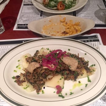 Coppelia - Top: Lo Mein Saltado (Linguine, shrimp, mussels, calamari, egg, soy sauce, ginger) /Bottom: Pernil (roasted pork & yuca) - Cuban Near Me - New York, New York Coppelia - Top: Lo Mein Saltado (Linguine, shrimp, mussels, calamari, egg, soy sauce, ginger) /Bottom: Pernil (roasted pork & yuca) - Cuban Near Me - New York, New York