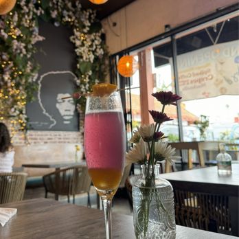 Butterfly Pea Cafe - Butterfly Pea Mango Mimosa - Creperies Near Me - Los Angeles, California Butterfly Pea Cafe - Butterfly Pea Mango Mimosa - Creperies Near Me - Los Angeles, California