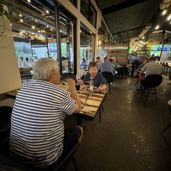 Revelry - View of the restaurant towards pizza prep place and bar - Wine Bars Near Me - Bozeman, Montana