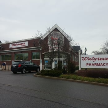 Walgreens - a car parked in front of a walgreens pharmacy - Cosmetics & Beauty Supply Near Me - Sayville, New York