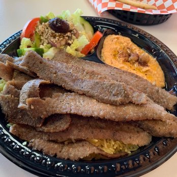 Zuki's Pita - Gyro meat cuts, greek salad, red pepper hummus and yellow rice peeping through. - Mediterranean Near Me - Phoenix, Arizona Zuki's Pita - Gyro meat cuts, greek salad, red pepper hummus and yellow rice peeping through. - Mediterranean Near Me - Phoenix, Arizona