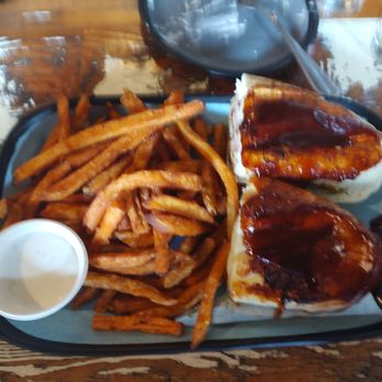 Natty Greene's Brewpub - Chobita sandwich:  roasted pork loin sandwich with sweet potato fries - Breweries Near Me - Greensboro, North Carolina