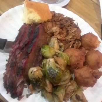 Kloby's Smokehouse - Brisket (tender in lean cut), Brussels sprouts (grilled flavor), hush puppies (so good!), pulled pork (omg), and cornbread (moist!). - Barbeque Near Me - Laurel, Maryland Kloby's Smokehouse - Brisket (tender in lean cut), Brussels sprouts (grilled flavor), hush puppies (so good!), pulled pork (omg), and cornbread (moist!). - Barbeque Near Me - Laurel, Maryland